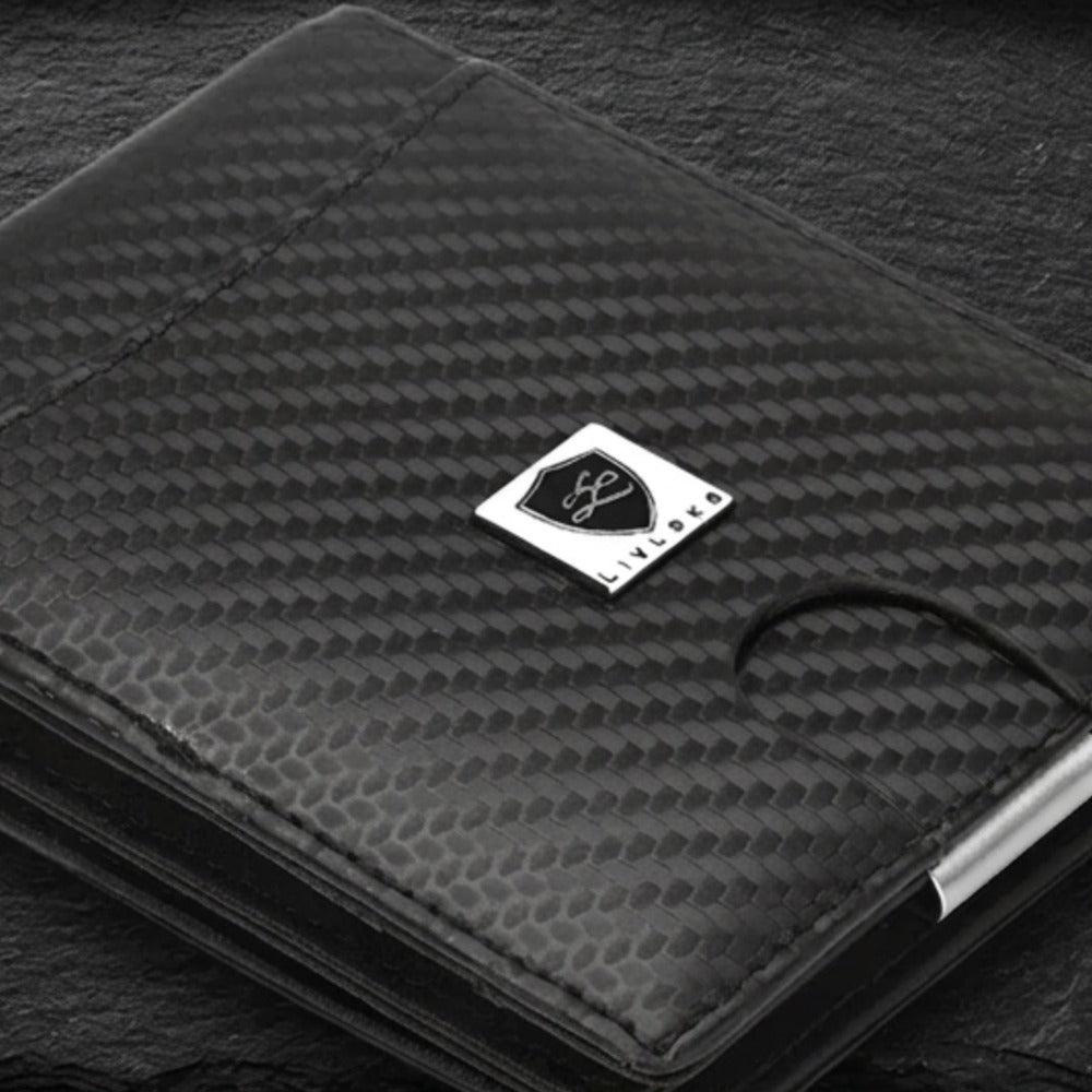 Close-up of the LIVLOKO London slim black money clip wallet showing the LIVLOKO shield badge