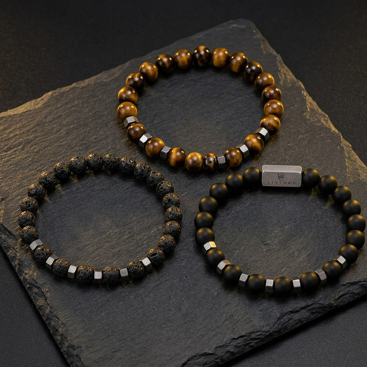 Men's beaded bracelet set, black and brown stack of three with metal accents, by LIVLOKO London