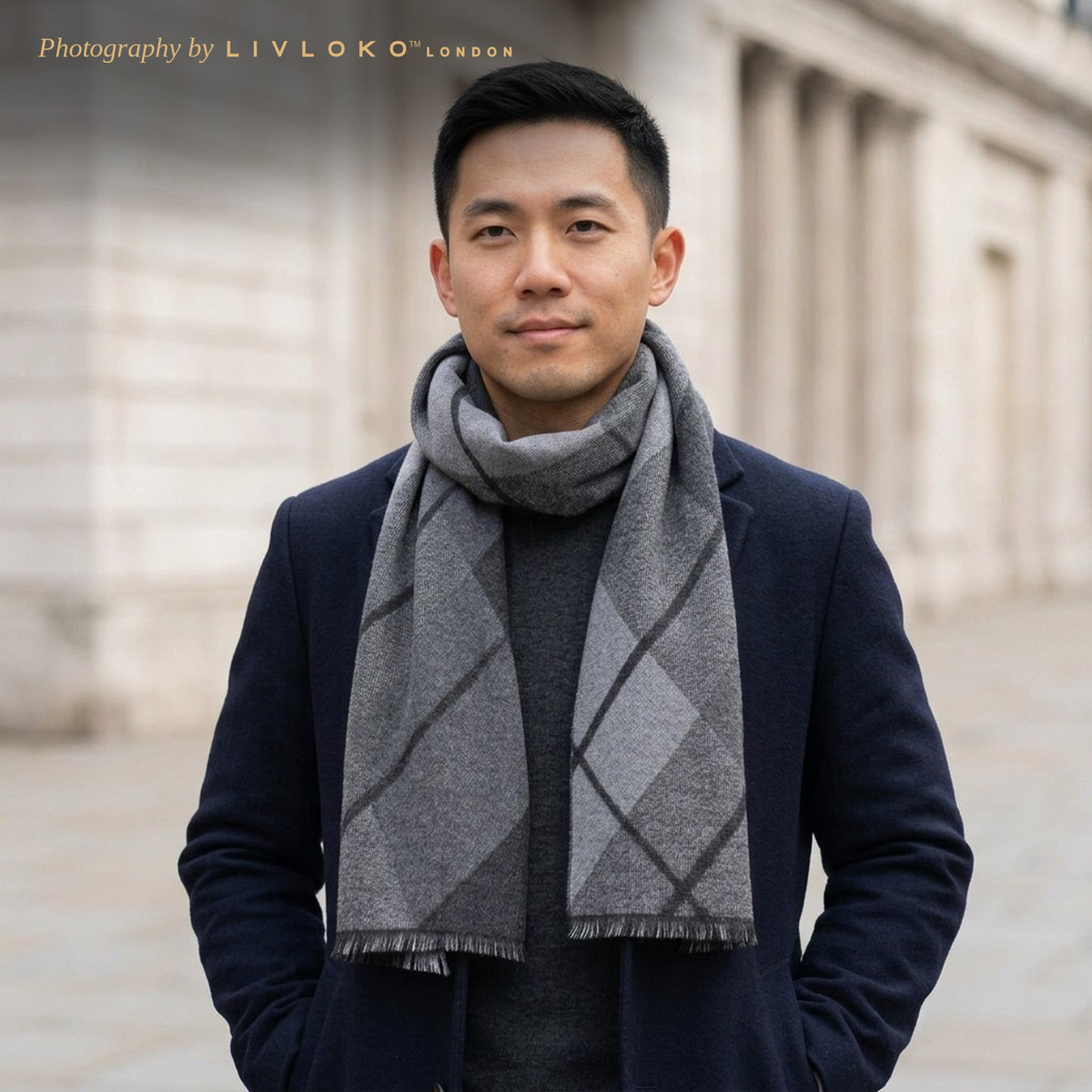 Man wearing the LIVLOKO London grey check wool scarf with a navy overcoat