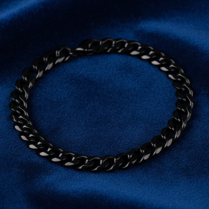 Men’s black stainless steel Cuban link bracelet with polished chain design