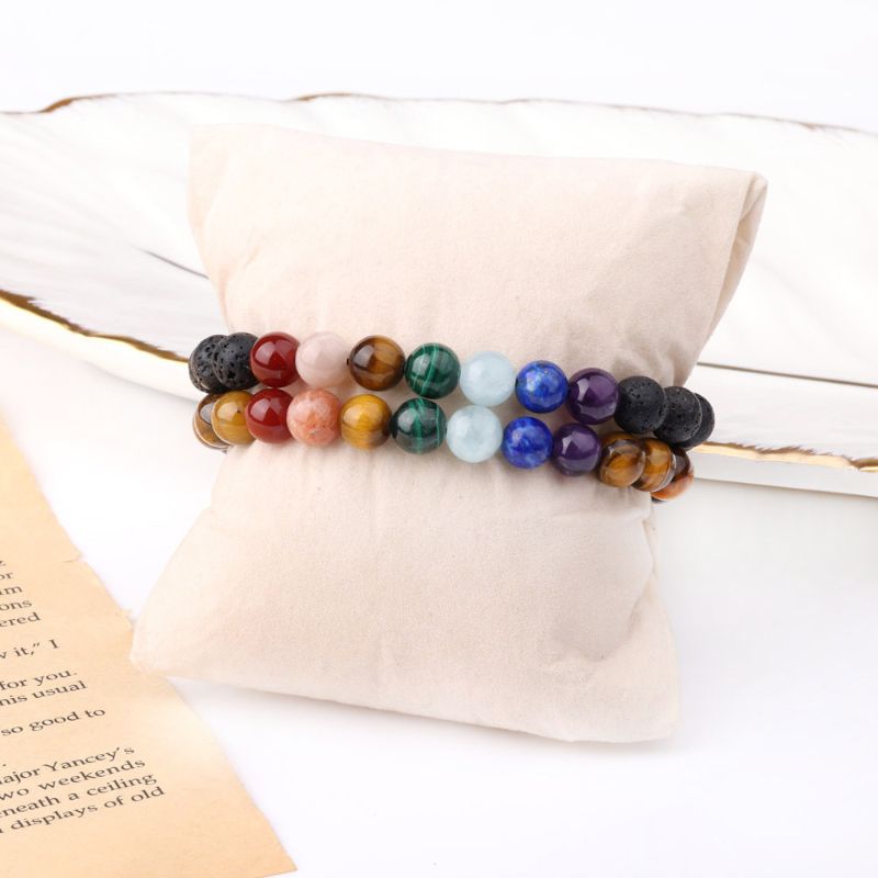 7 Chakra Couple Bracelets 7 Chakra Couple Bracelet Set around a foam