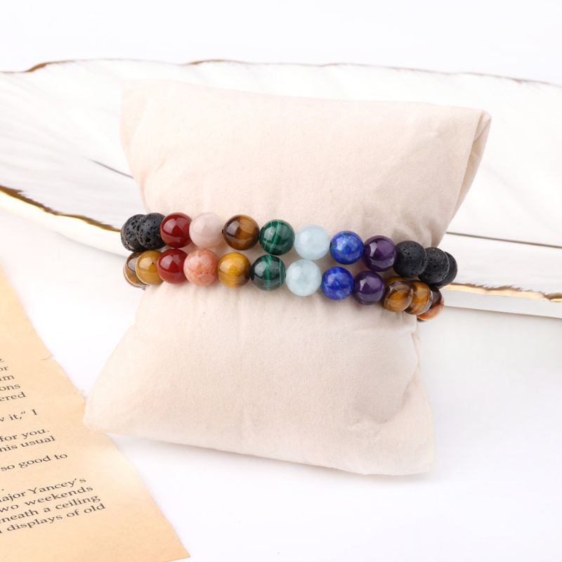 7 Chakra Couple Bracelet Set around a foam