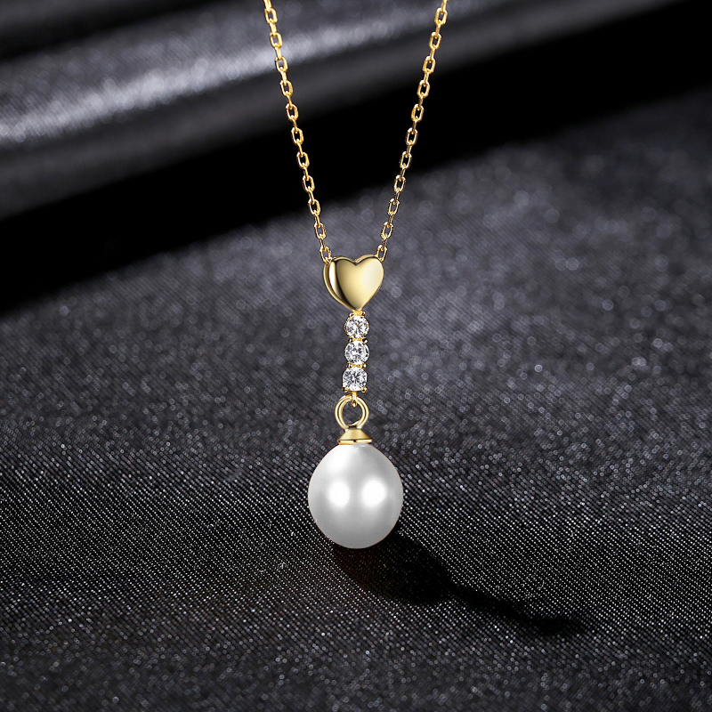 Sterling Silver Pearl Necklace with Heart Detail