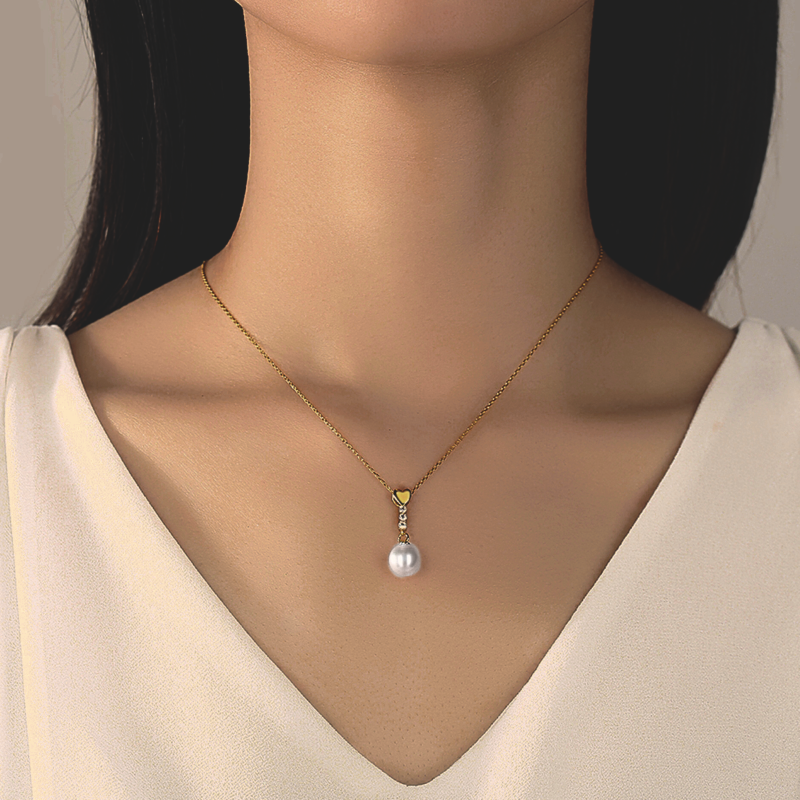 Sterling Silver Pearl Necklace with Heart Detail