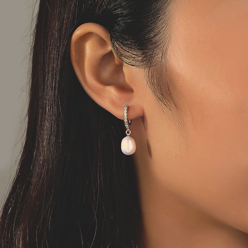 Silver and Pearl Drop Earring with Zirconia image of half face of woman, wearing S925 Sterling Silver Natural Pearl Earring