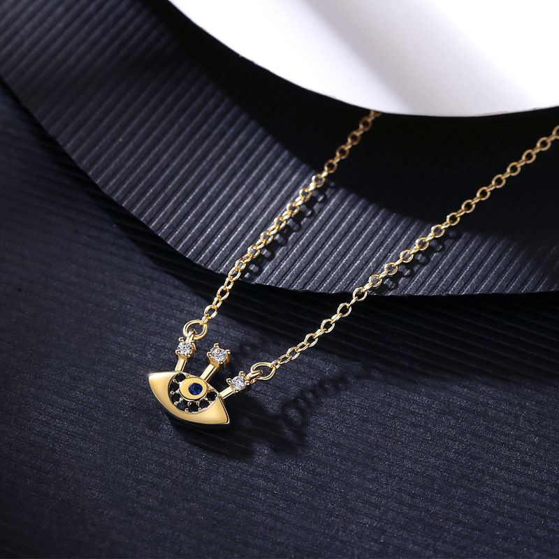 Model wearing Sterling Silver 18ct Gold Plated Protective Eye Zirconia Necklace