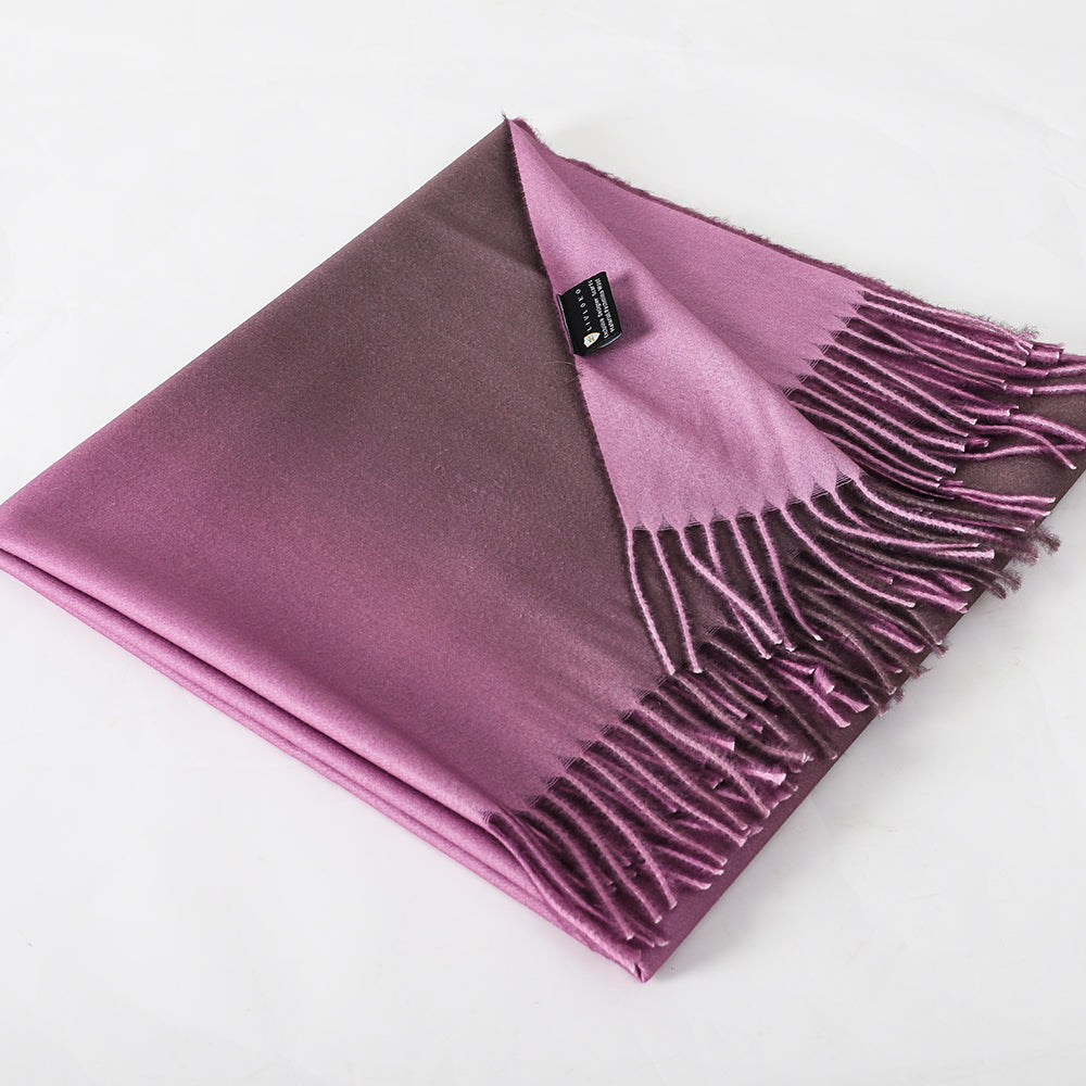 Pink and Brown Pashmina Shawl, folded beside its product tag
