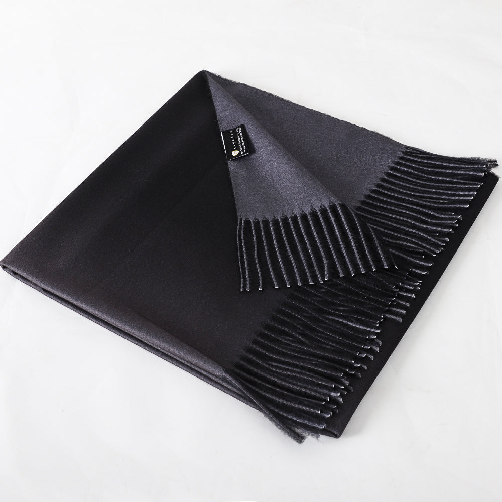 Black and Grey Pashmina Shawl, folded beside its product tag