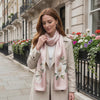 Ivory Magnolia blush pink mulberry silk scarf worn in Mayfair, London, by LIVLOKO London