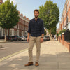 Video of the men's tiger eye and black agate bracelet set worn on a sunny London street by LIVLOKO London