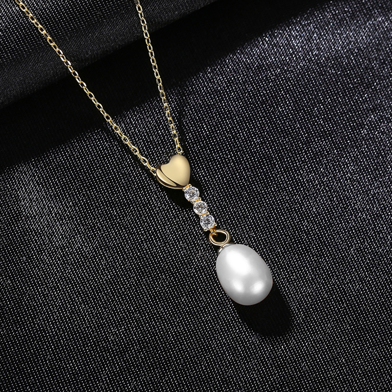Sterling Silver Pearl Necklace with Heart Detail