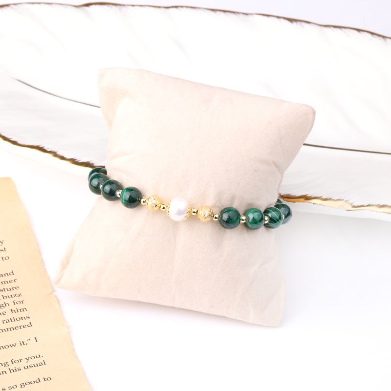 Malachite Crystal & Pearl Bracelet 18ct Gold Plated around a foam