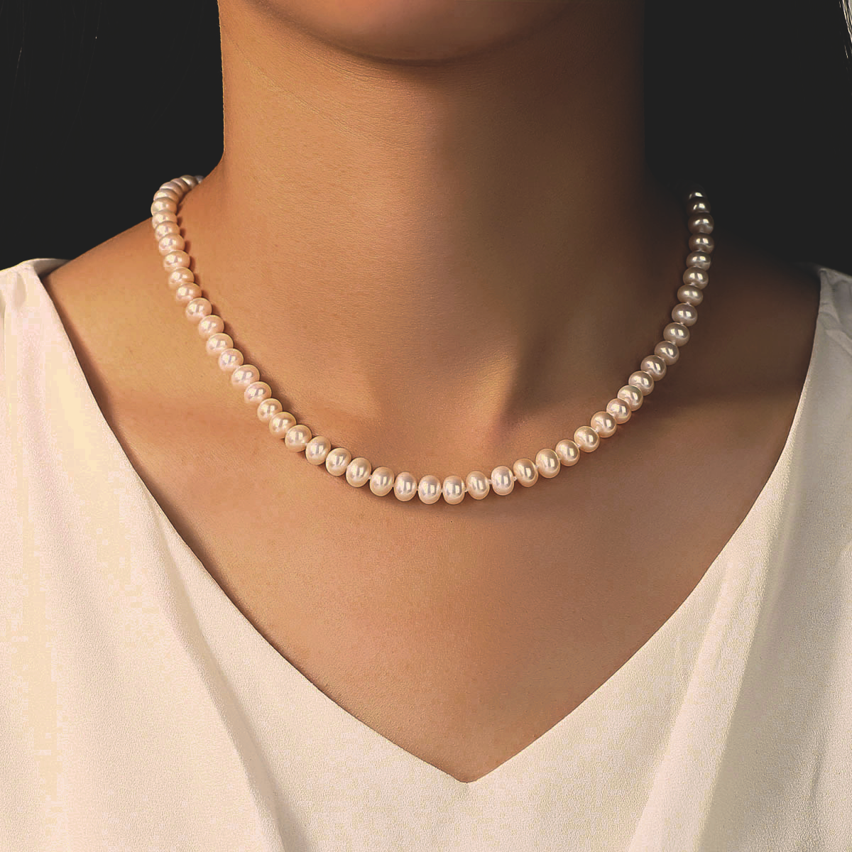 S925 Sterling Silver Natural Pearl Necklace around woman's neck