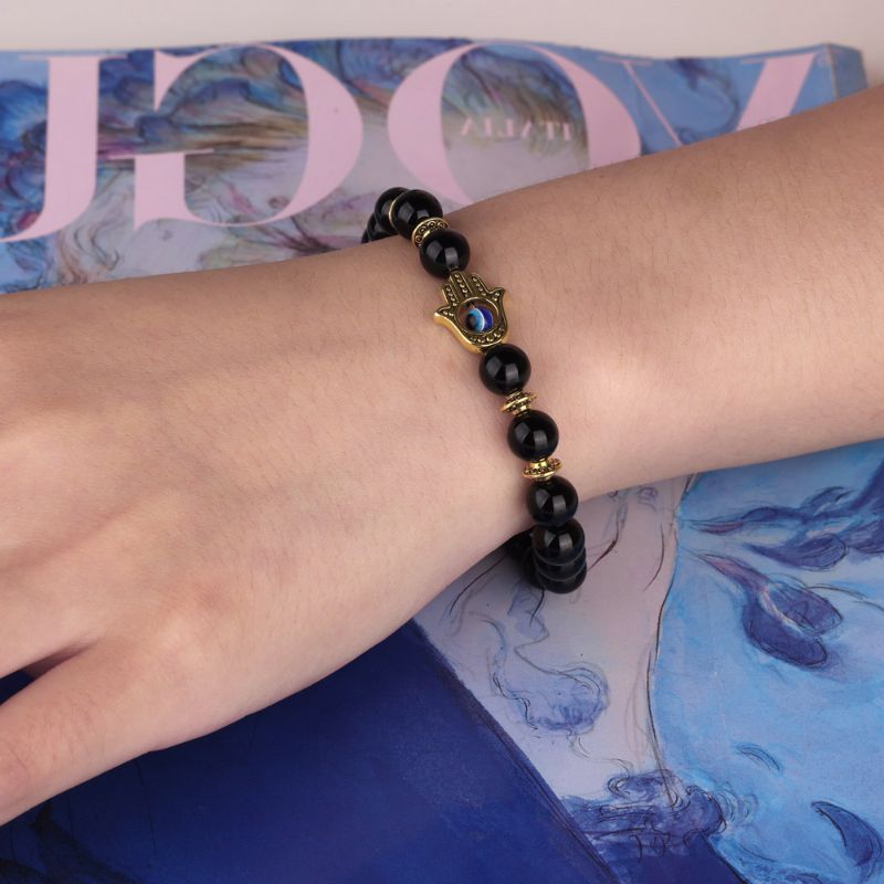 Agate Hamsa Evil Eye Protection Bracelet on woman's wrist