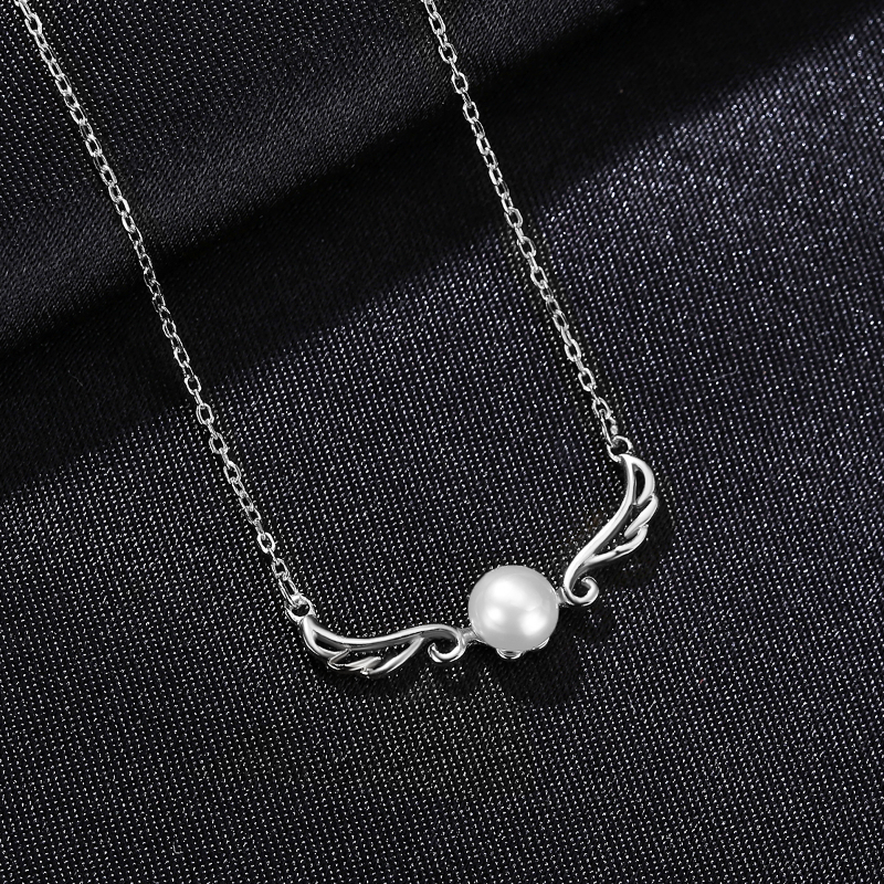 S925 Sterling Silver Natural Pearl Necklace placed on black surface