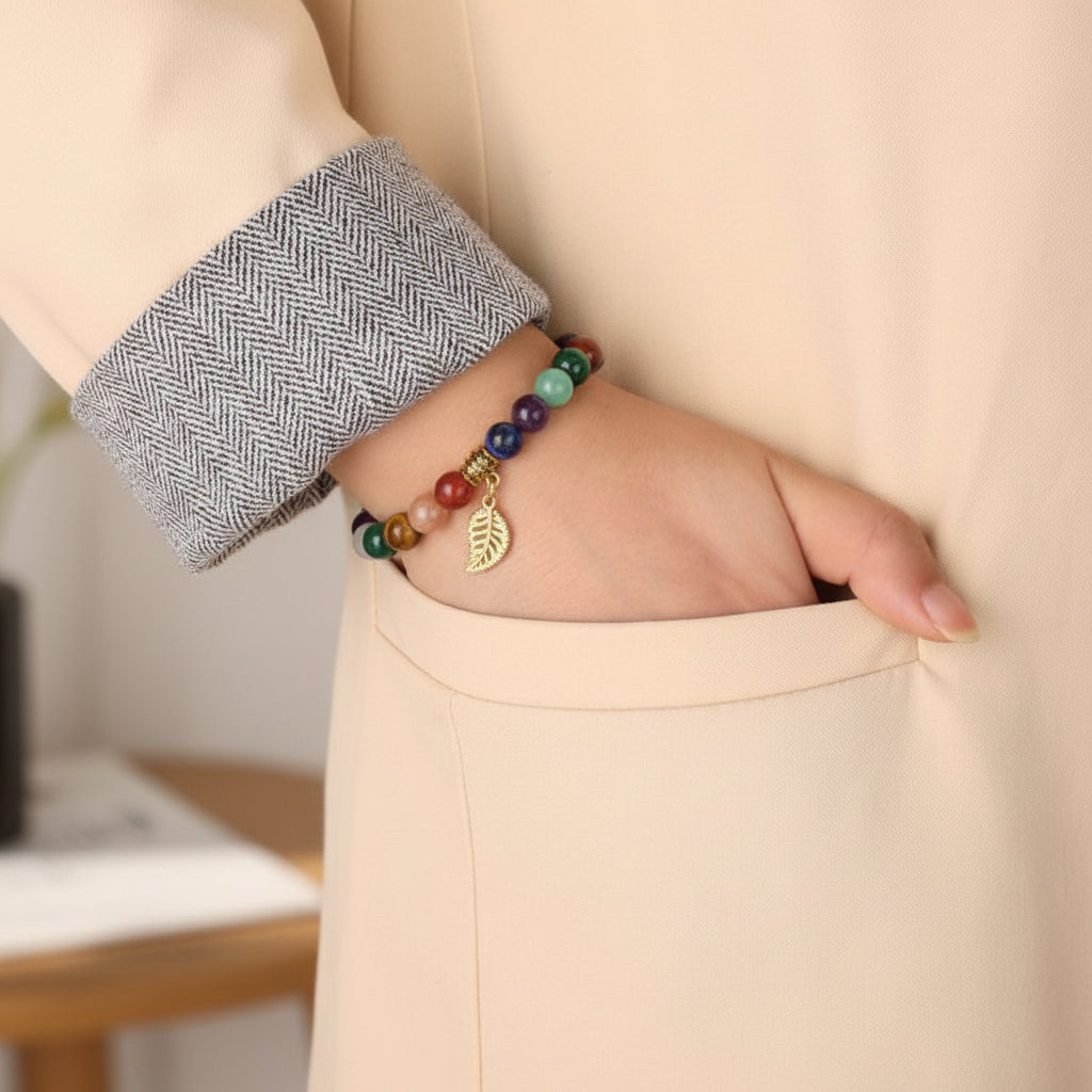 7 Chakra Bracelet & Leaf Pendant around woman's wrist