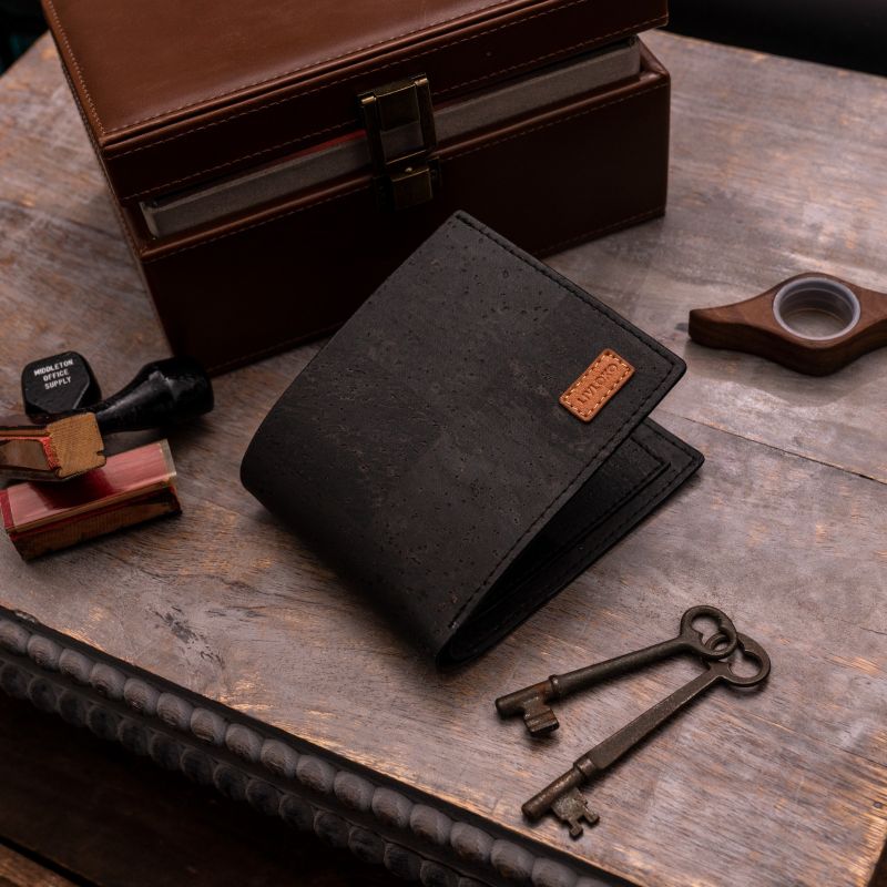 Classic Cork Vegan Leather Minimalist black Wallet placed on table with 2 keys and a box