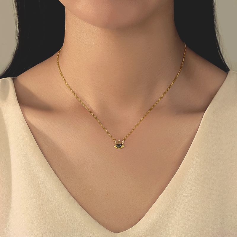 Model wearing Sterling Silver 18ct Gold Plated Protective Eye Zirconia Necklace