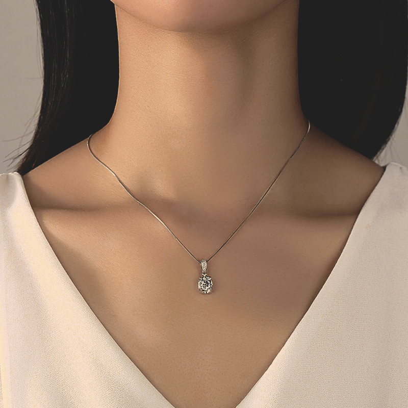 S925 Sterling Silver Moissanite Necklace around woman's neck