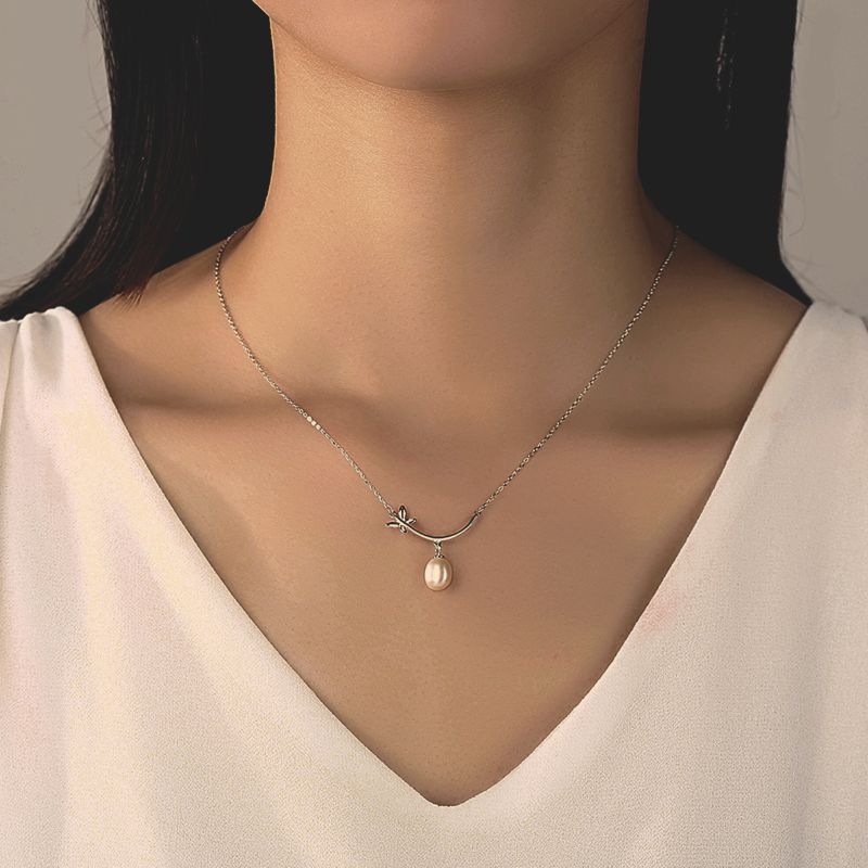 a beautiful unique designed S925 Sterling Silver Natural Pearl Necklace around woman's neck