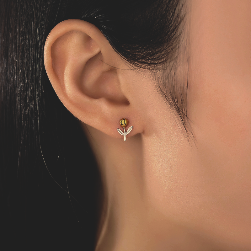 image of woman's ear wearing S925 Sterling Silver 18ct Gold Plated Rose Earring