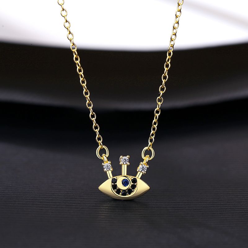 Model wearing Sterling Silver 18ct Gold Plated Protective Eye Zirconia Necklace