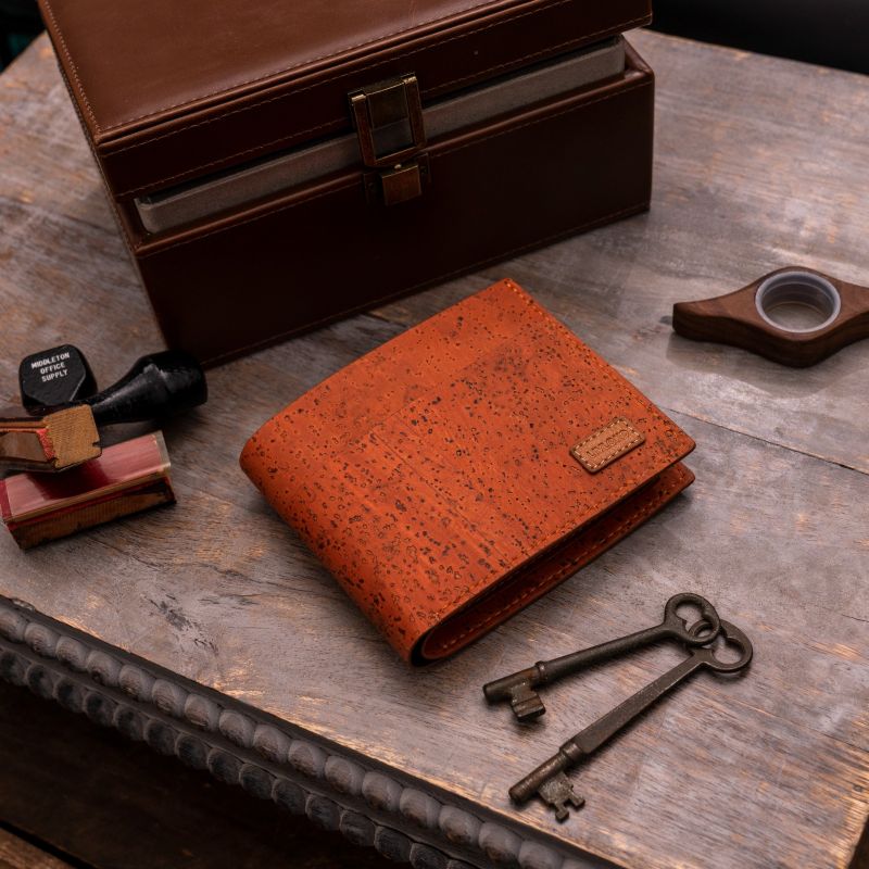 Cork Classic Tan leather wallet placed with 2 keys and a box 